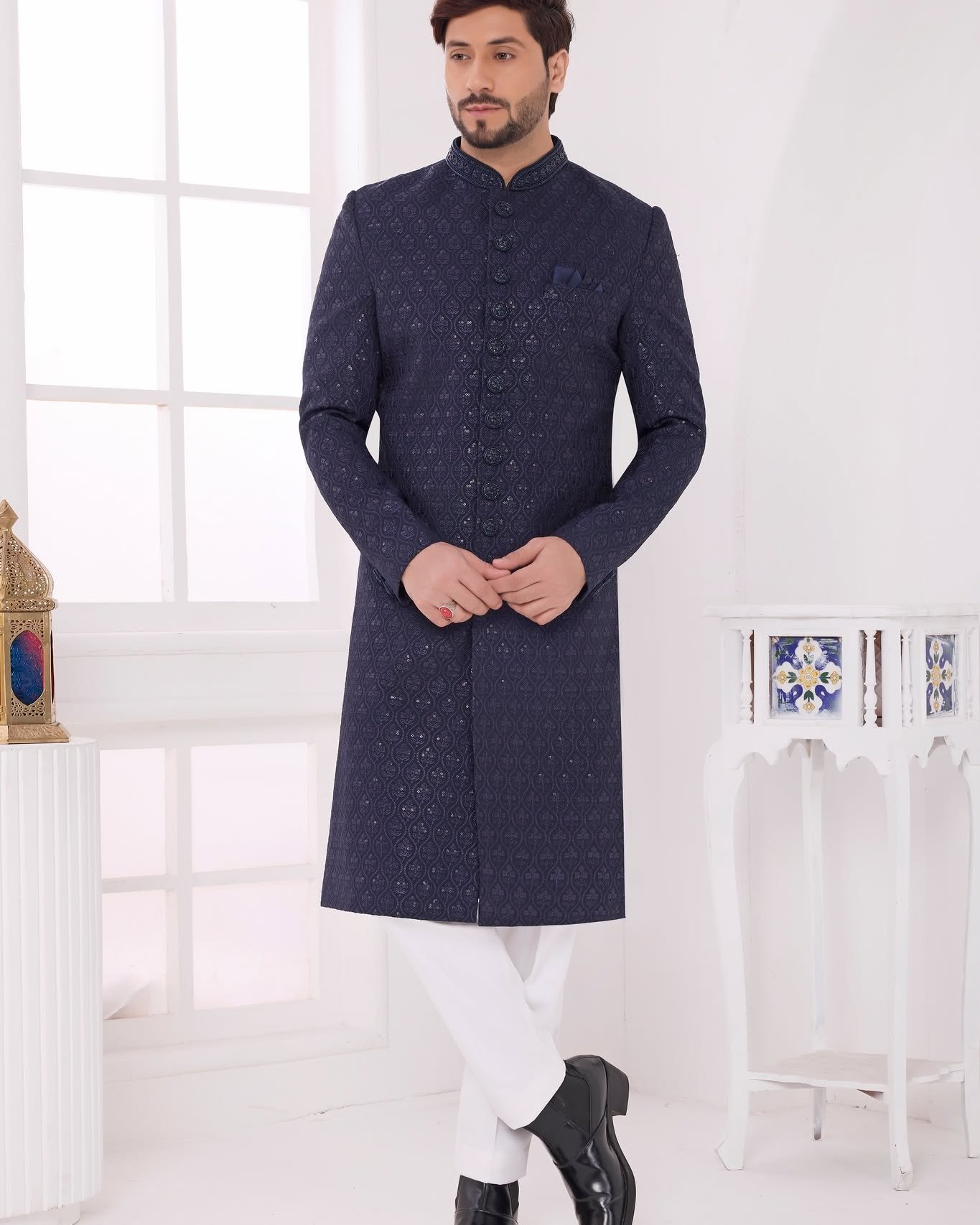 Step into timeless elegance with this premium Navy Blue Designer Indo Western Jacket Set